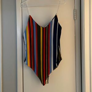 One piece, snap in between top